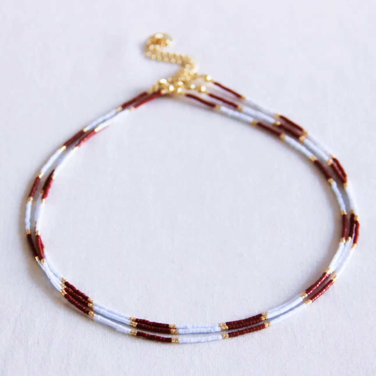 Collana Bagliore azzurro e bordeaux preorder 12 Giugno