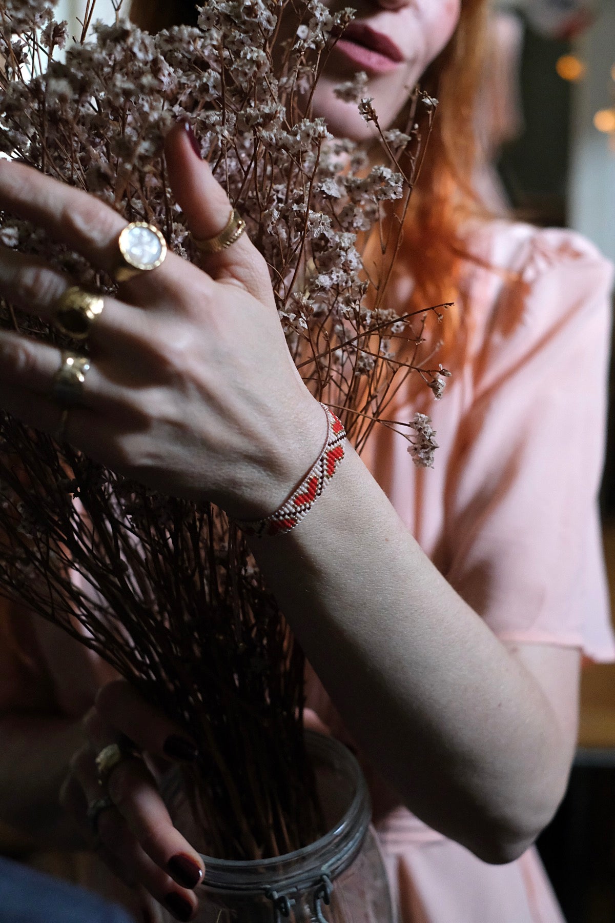 Bracciale intrecciato cuori rosso e rosa