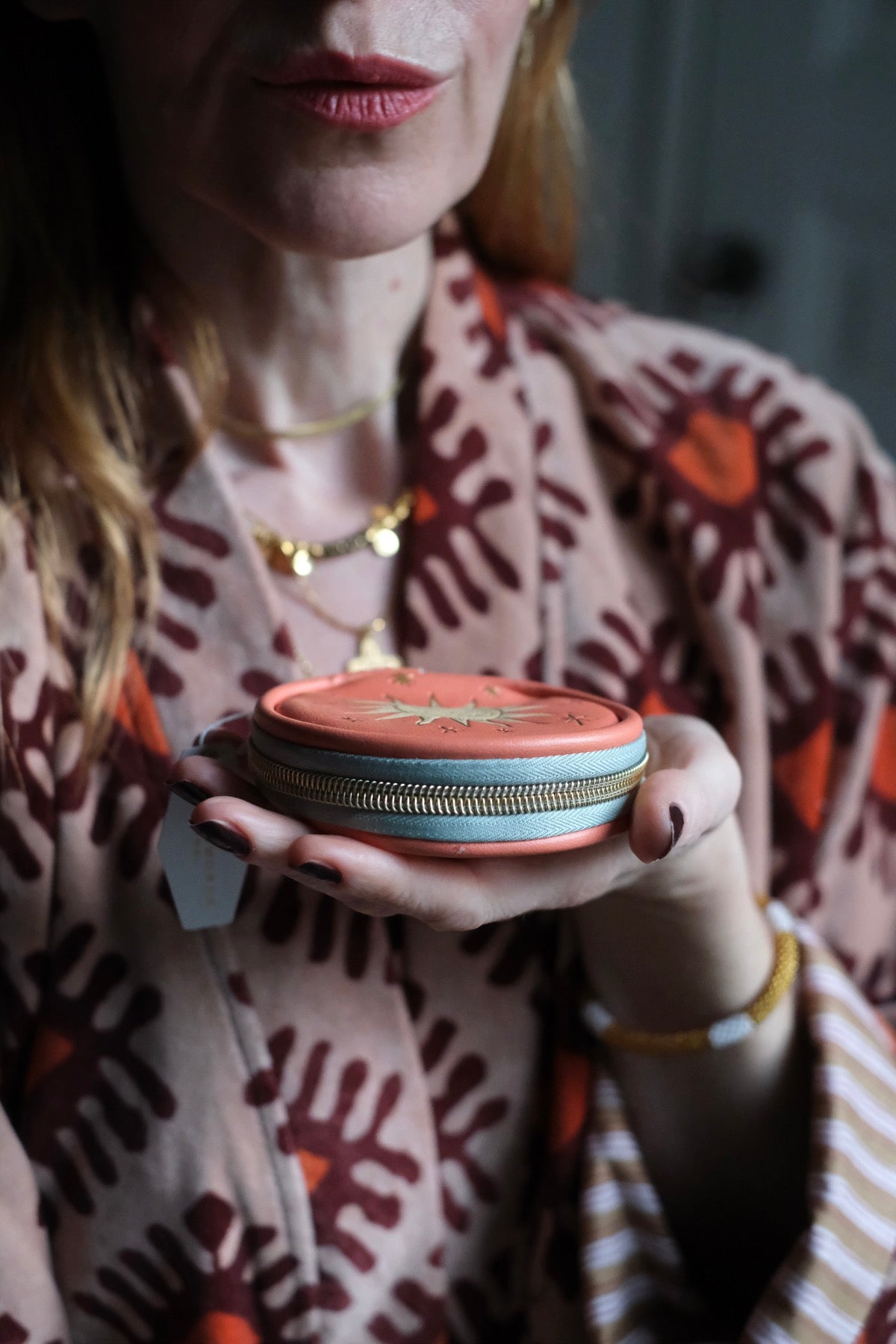 Portamonete o portapillole Sole