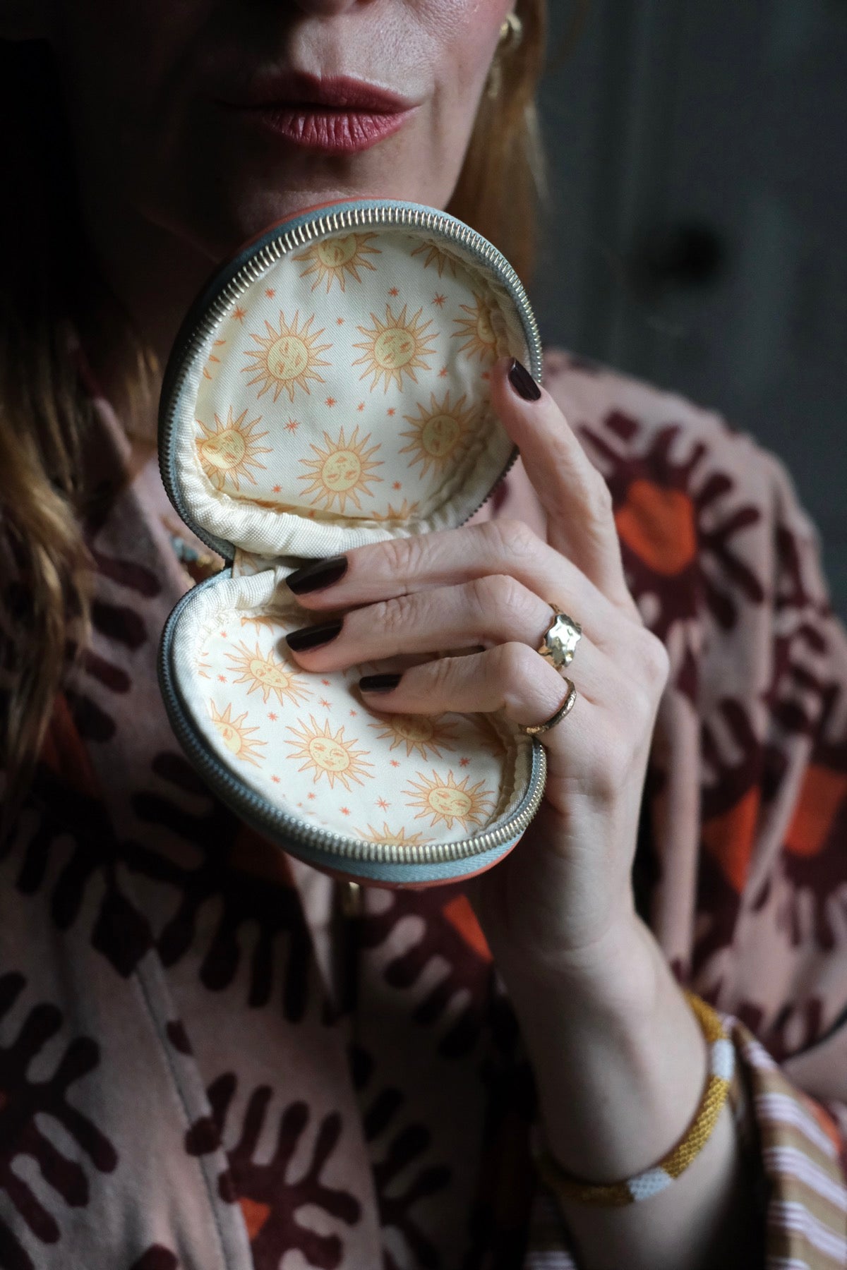 Portamonete o portapillole Sole