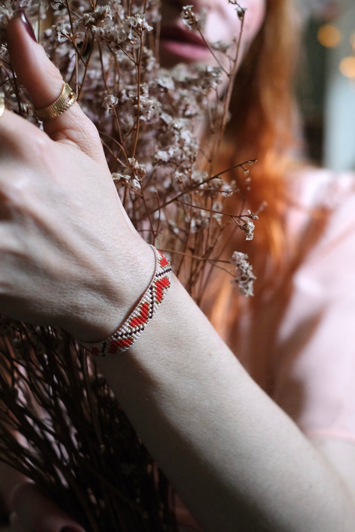 Bracciale intrecciato cuori rosso e rosa