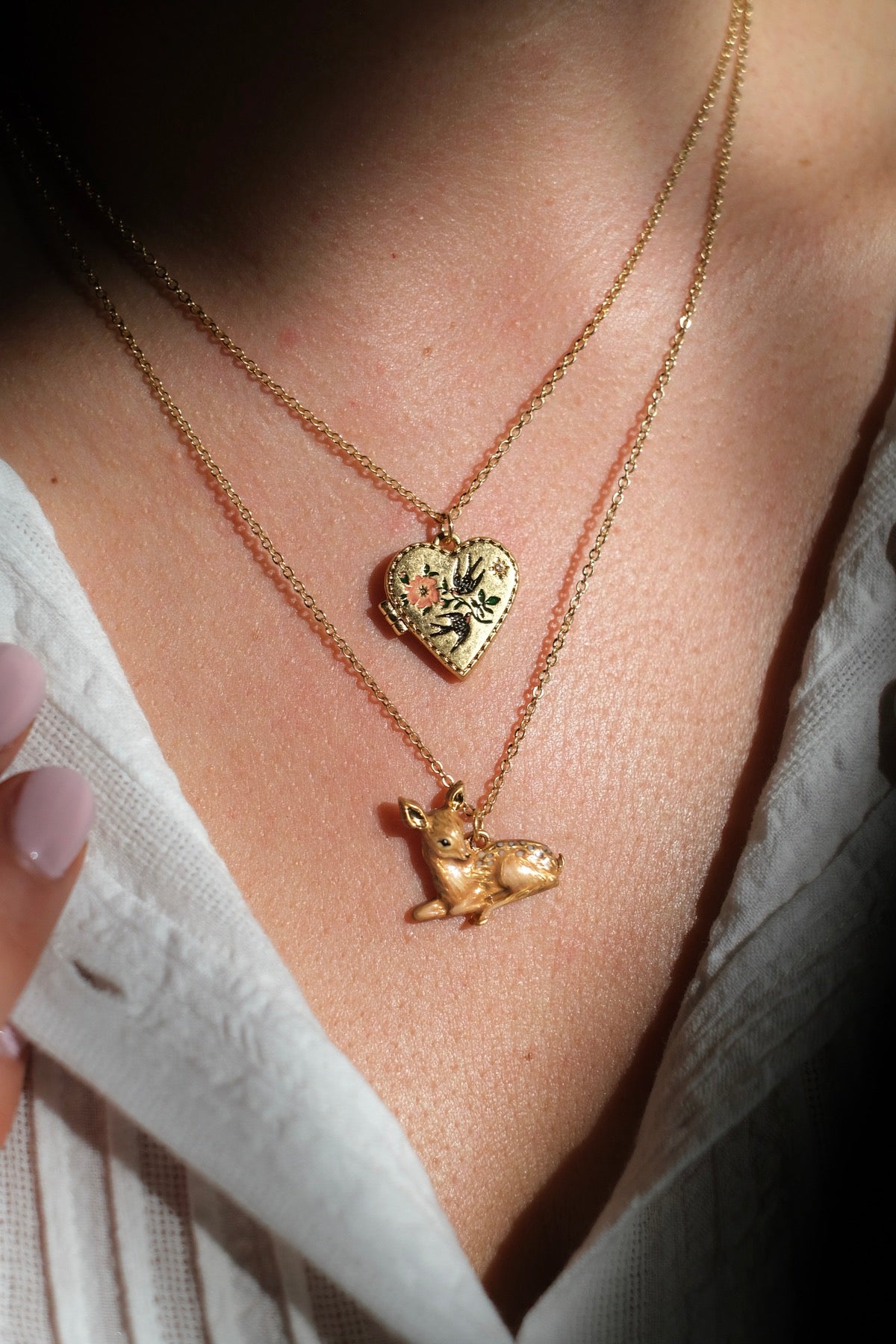 Collana cuore scrigno rondini e Collana Bambi