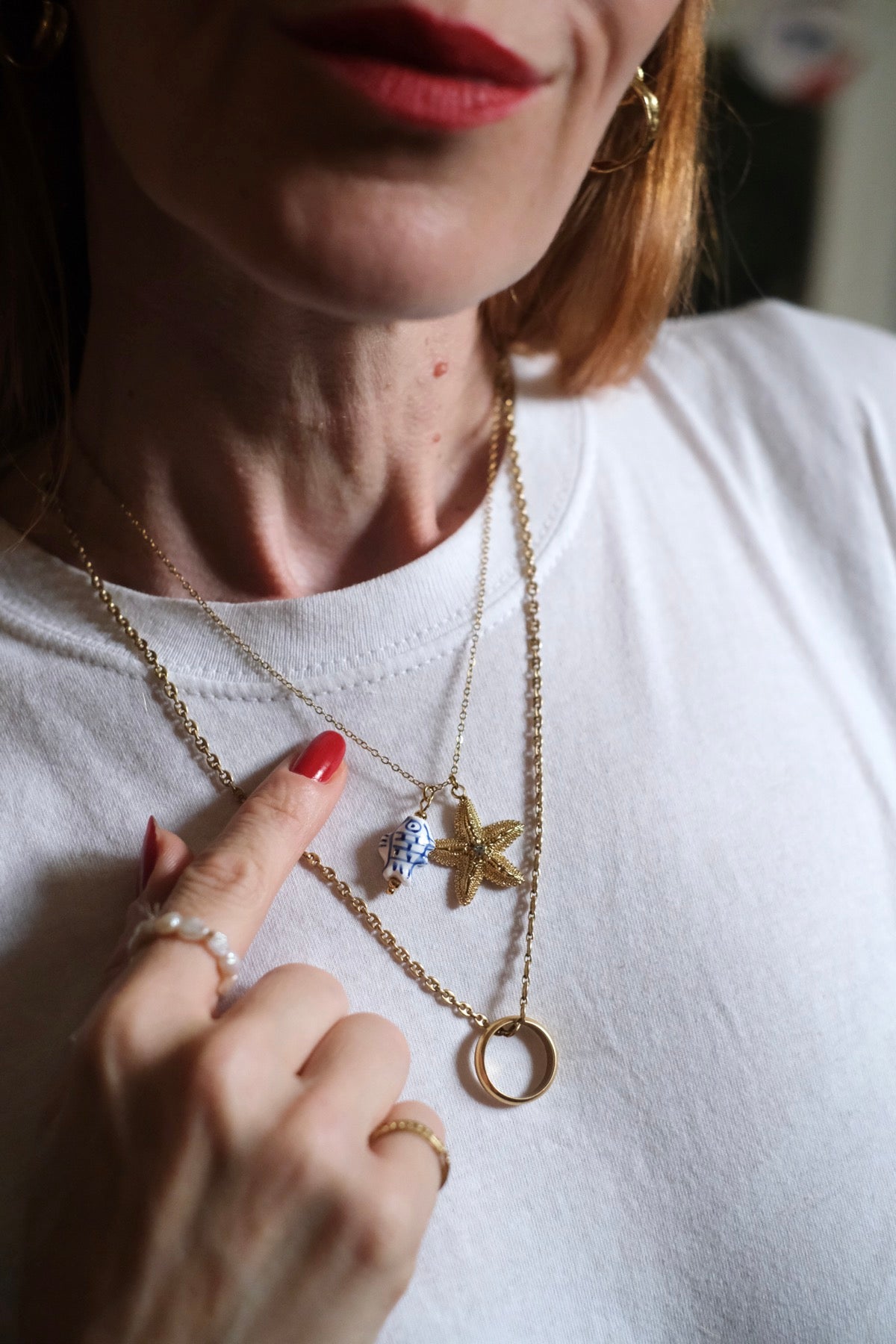 Collana Pesce e stella marina blu bianco e oro