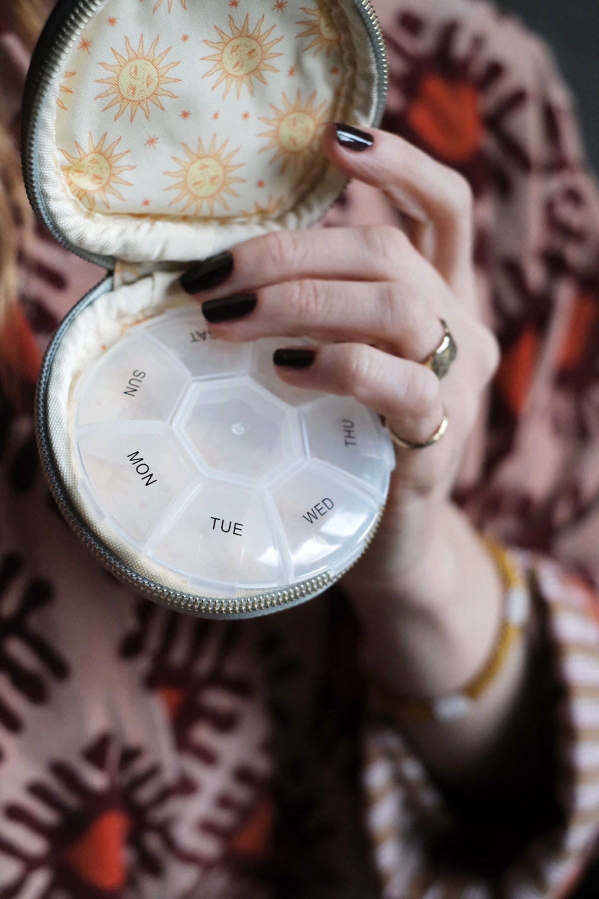 Portamonete o portapillole Sole